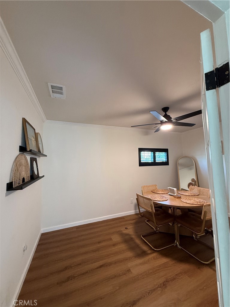 3359 Locust Street Riverside, CA 92501 - Photo 17 of 23 a workspace with furniture and wooden floor