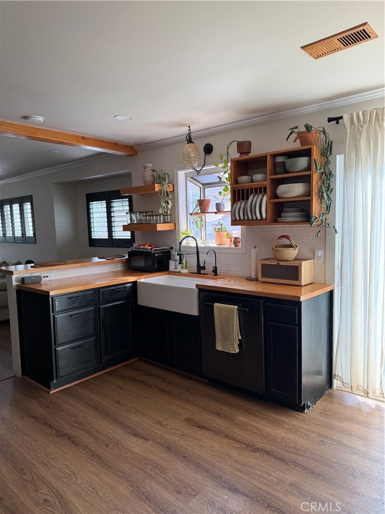 3359 Locust Street Riverside, CA 92501 - Photo 5 of 23 a kitchen with stainless steel appliances granite countertop a sink and cabinets