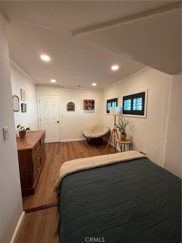 3359 Locust Street Riverside, CA 92501 - Photo 10 of 23 a living room with furniture and a flat screen tv