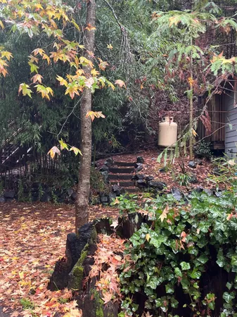 an aerial view of a livingroom with furniture