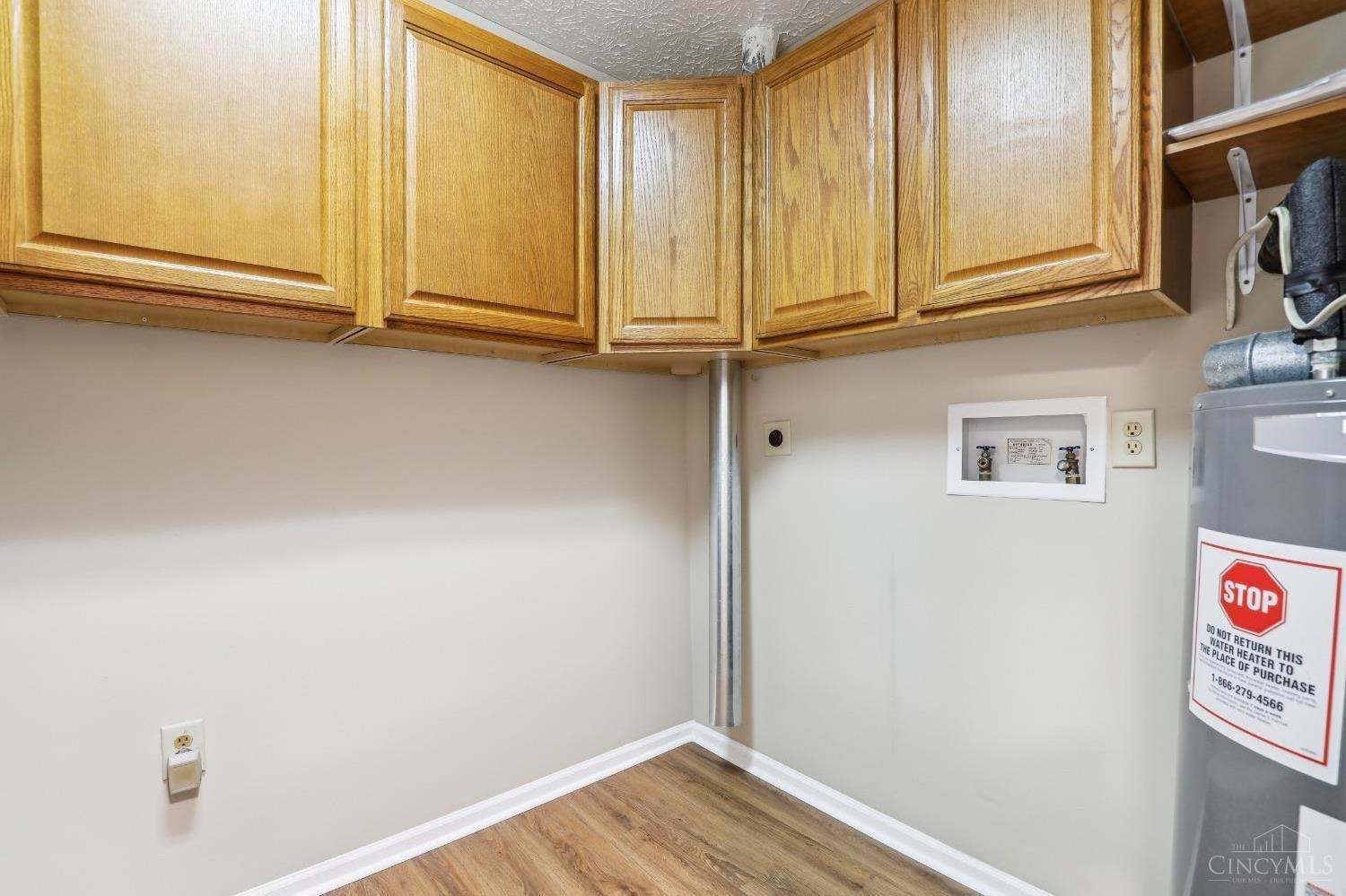 7343 Ridgepoint Drive, Unit 101 Cincinnati, OH 45230 - Photo 23 of 30 Laundry Room & Utility Room w/Cabinet Storage.