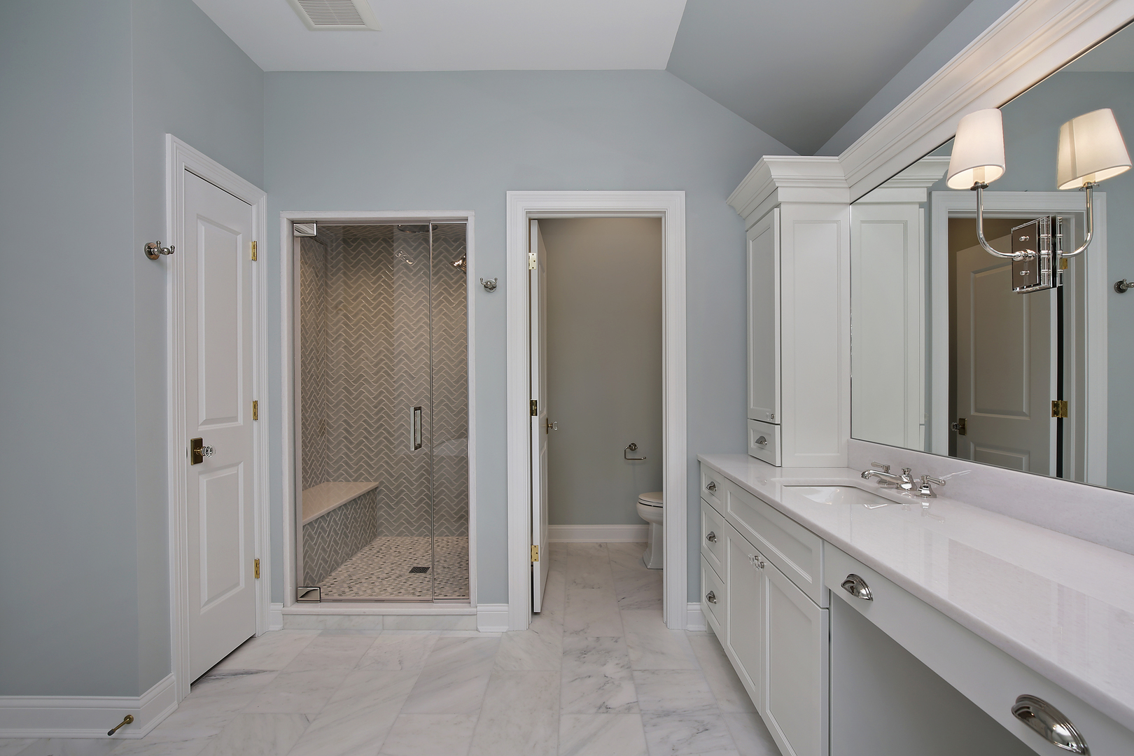 239 Ridge Avenue Winnetka, IL 60093 - Photo 11 of 14 a bathroom with a double vanity sink mirror and shower