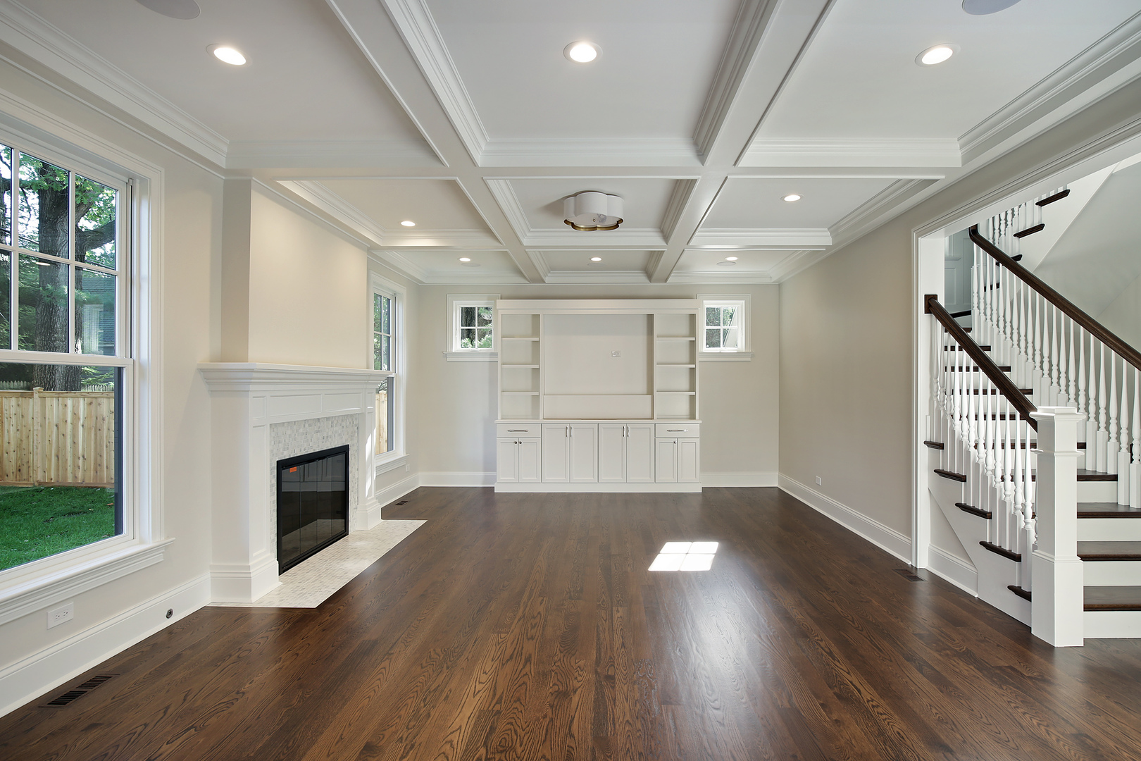 239 Ridge Avenue Winnetka, IL 60093 - Photo 4 of 14 a view of an empty room with wooden floor fireplace and windows