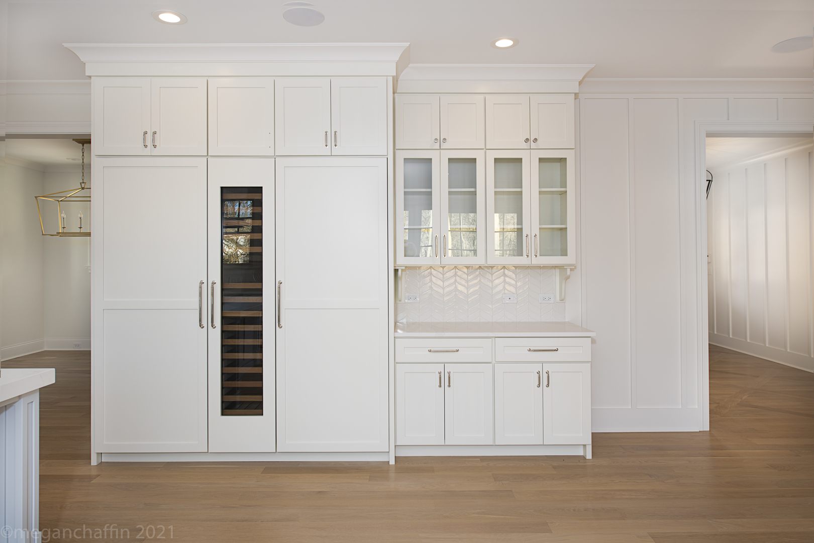239 Ridge Avenue Winnetka, IL 60093 - Photo 6 of 14 a view of wooden floor and windows in a kitchen