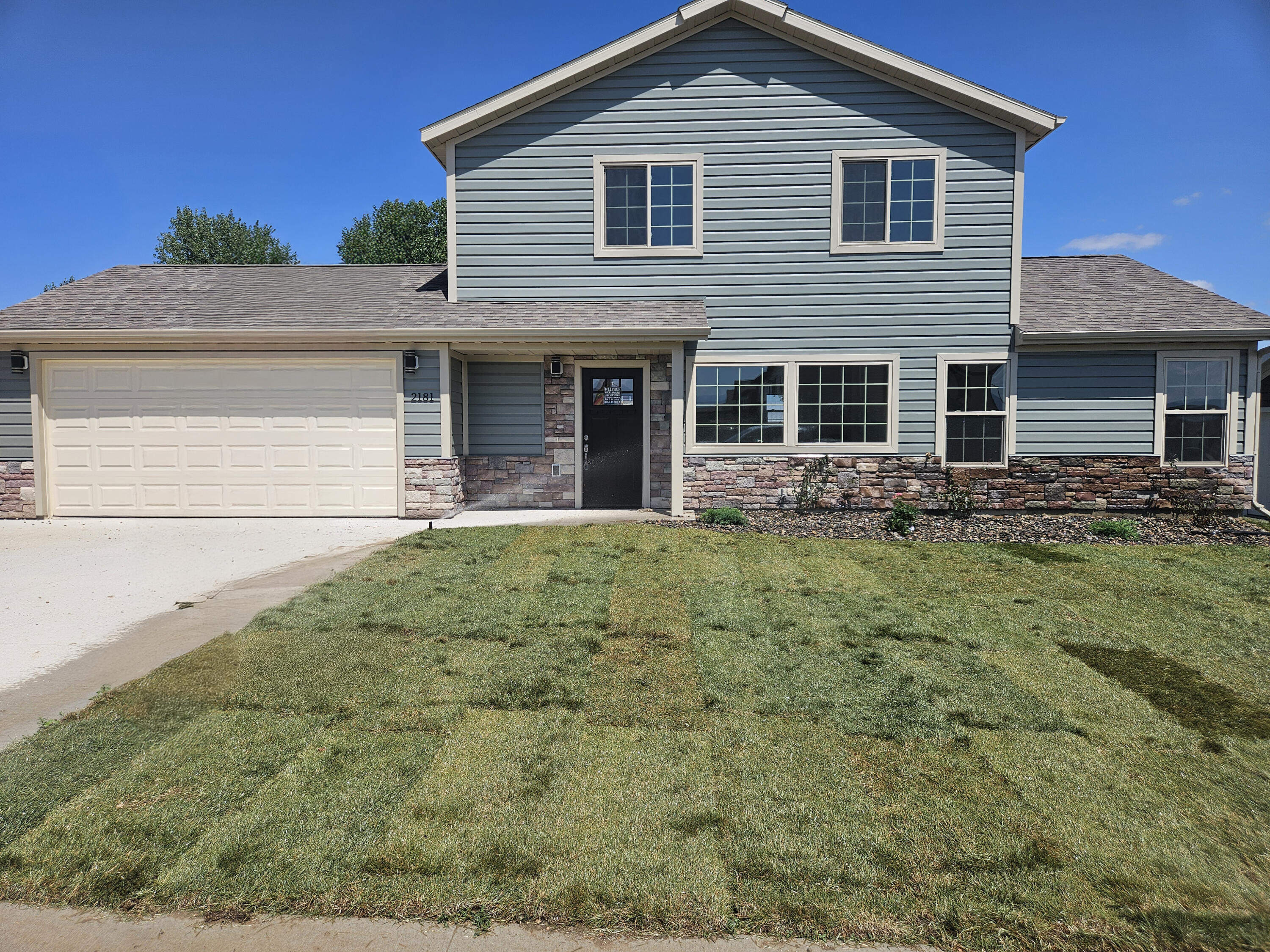 2181 Excalibur Way, Unit HB8) Sheridan, WY 82801 - Photo 1 of 23 Front