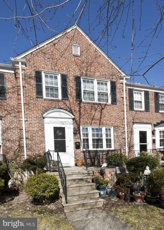 198 Stanmore Road Baltimore, MD 21212 - Photo 2 of 24 a front view of a house with many windows