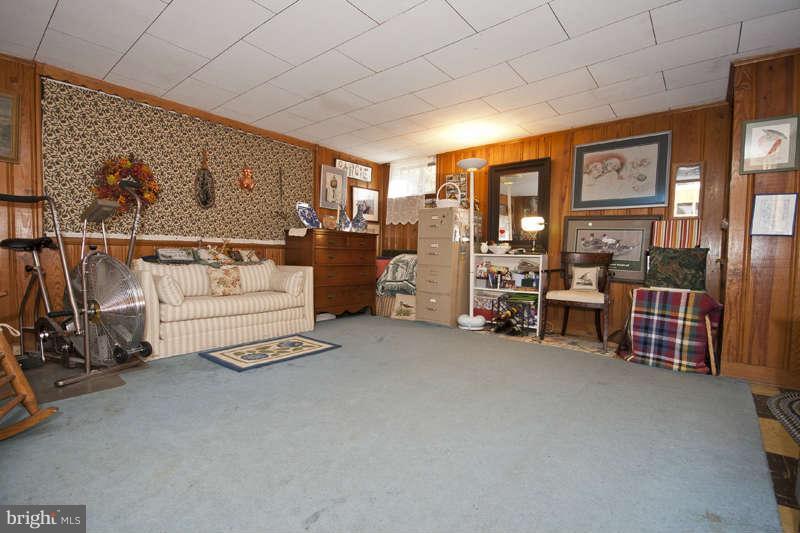 198 Stanmore Road Baltimore, MD 21212 - Photo 12 of 24 a view of livingroom with furniture and windows