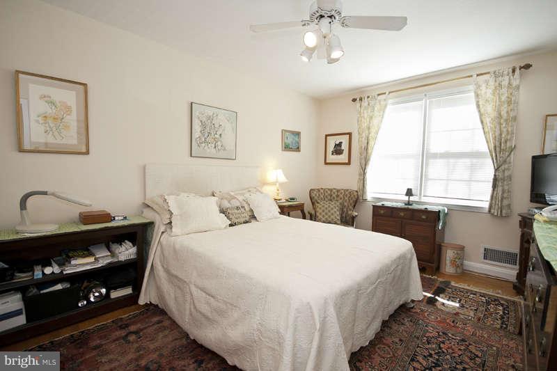 198 Stanmore Road Baltimore, MD 21212 - Photo 14 of 24 a bedroom with a bed and a window