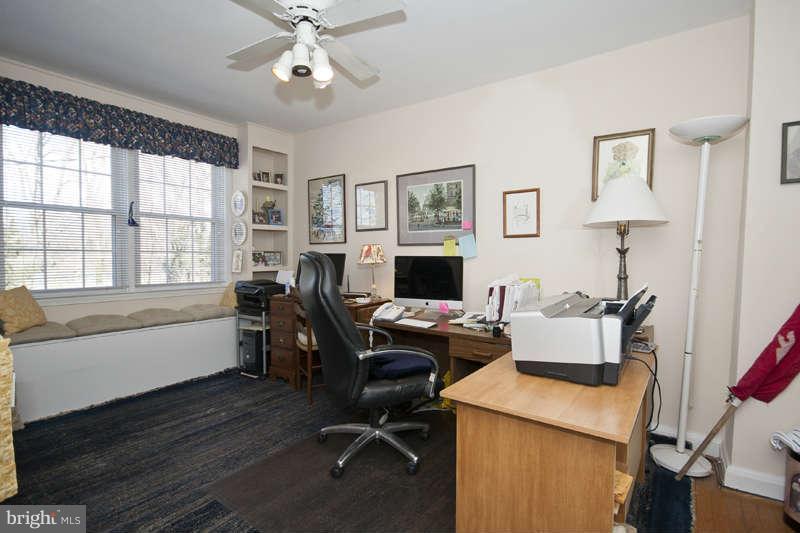 198 Stanmore Road Baltimore, MD 21212 - Photo 16 of 24 a view of a workspace with furniture and a window