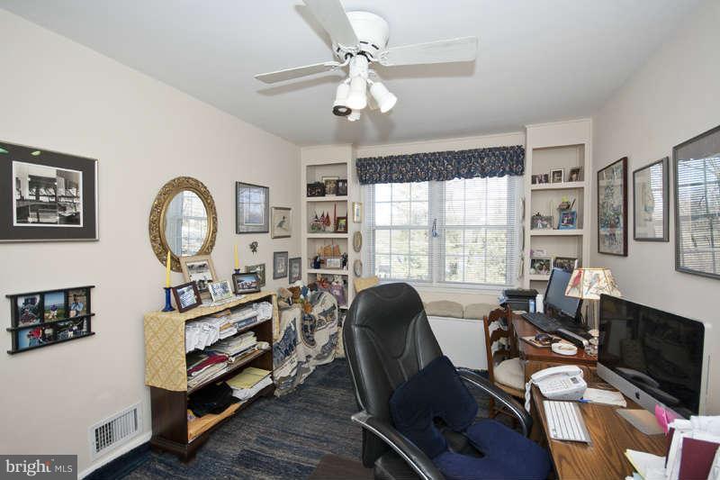 198 Stanmore Road Baltimore, MD 21212 - Photo 17 of 24 a view of a workspace with furniture and a window