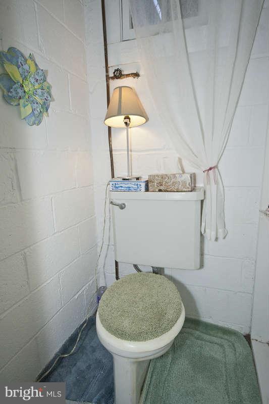 198 Stanmore Road Baltimore, MD 21212 - Photo 23 of 24 a bathroom with a sink and toilet