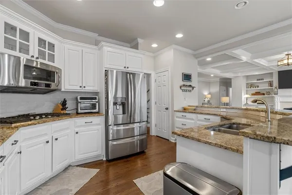 a view of entryway with wooden floor