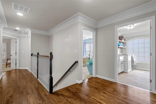 a spacious bedroom with a bed and a window