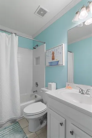 a spacious bathroom with a sink a large mirror and a bathtub