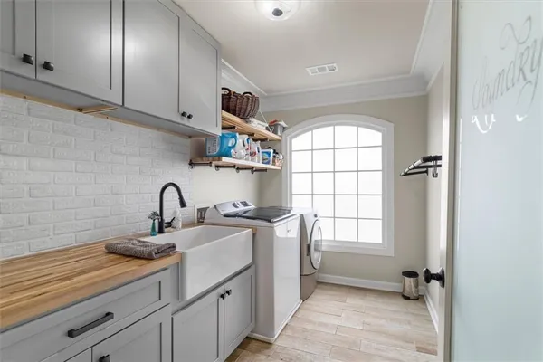 a living room with furniture stove and a window