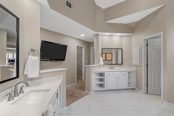 a view of a chair with fire pit in the backyard