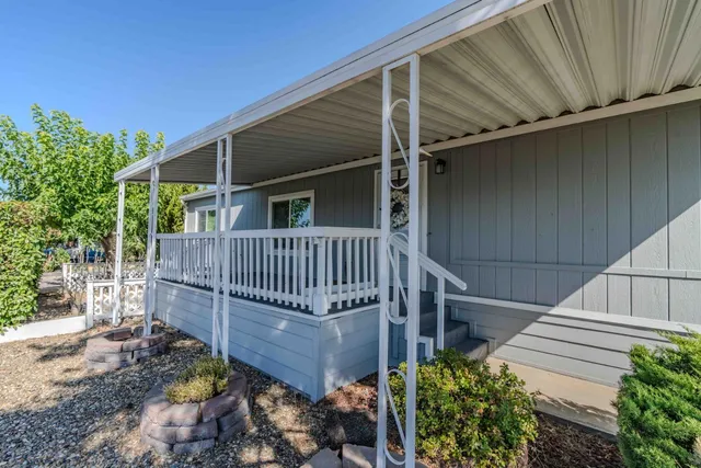 a view of balcony with small garden
