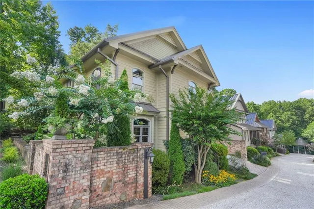 front view of a house with a small yard