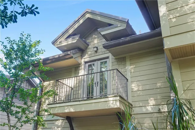 a kitchen with a sink stove and refrigerator