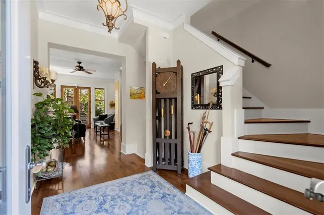 a bedroom with a bed couch and window