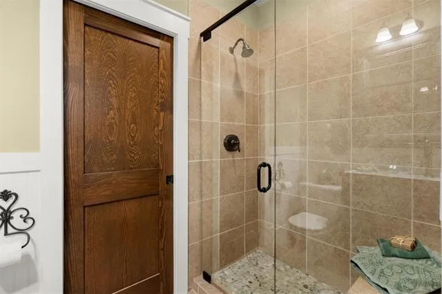 a room with furniture and pool table