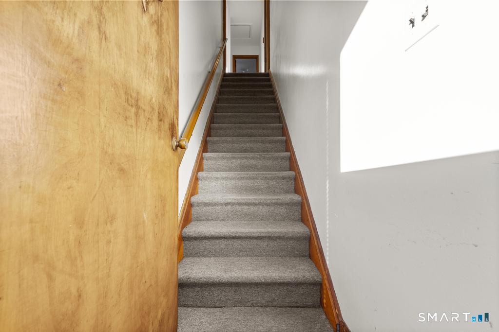 16 Harold Avenue Greenwich, CT 06830 - Photo 3 of 14 a view of a hallway with stairs