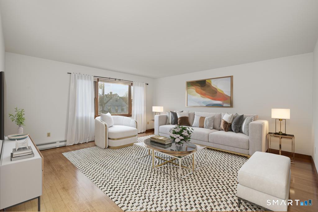 16 Harold Avenue Greenwich, CT 06830 - Photo 6 of 14 a living room with furniture a rug potted plant and a window