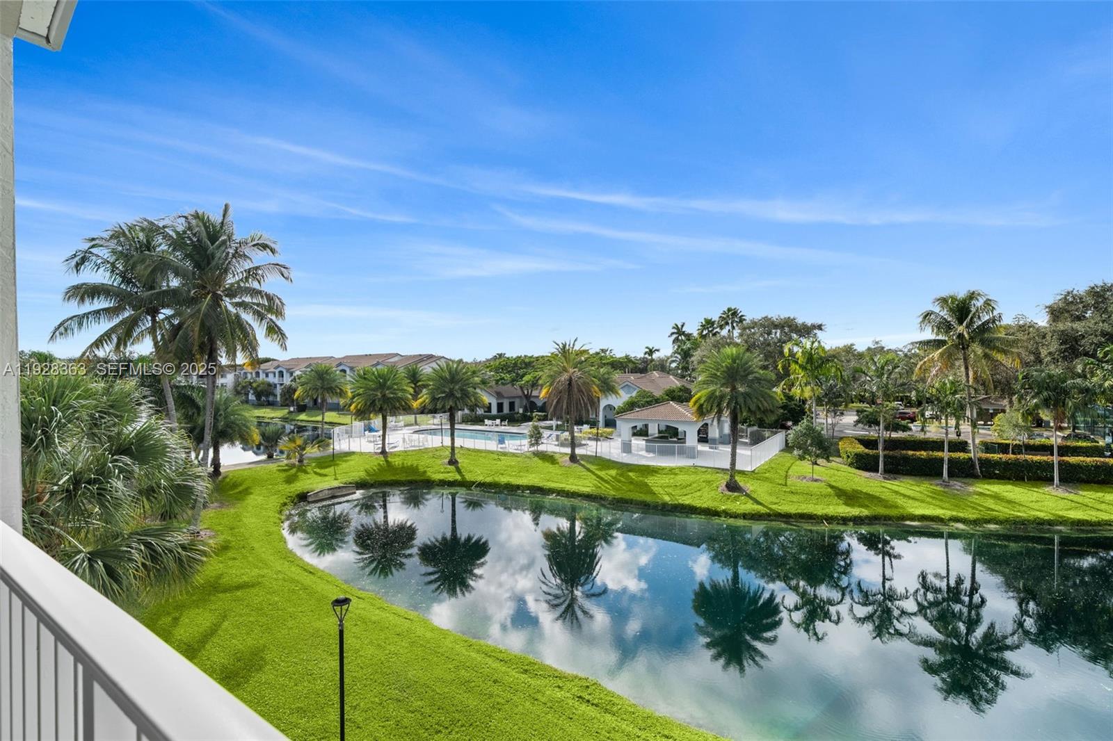 2600 South University Drive, Unit 326 Davie, FL 33328 - Photo 1 of 22 a view of a swimming pool with a yard