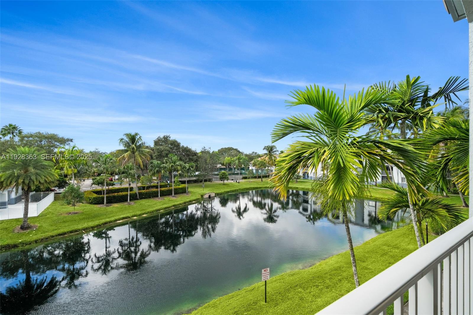 2600 South University Drive, Unit 326 Davie, FL 33328 - Photo 22 of 22 a view of a lake with a yard