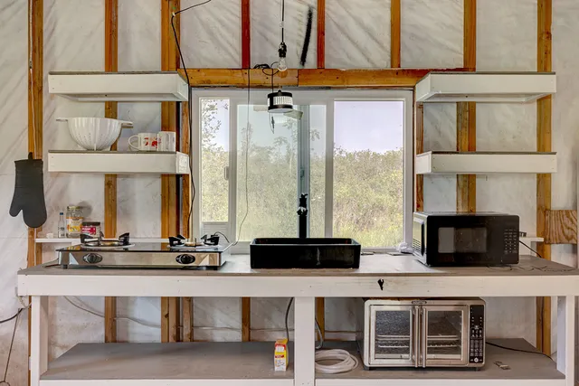 a view of a yard with an outdoor space