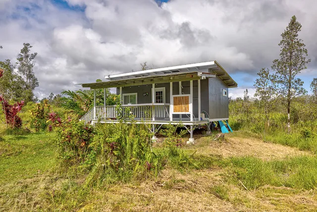 a view of a porch with wooden floor