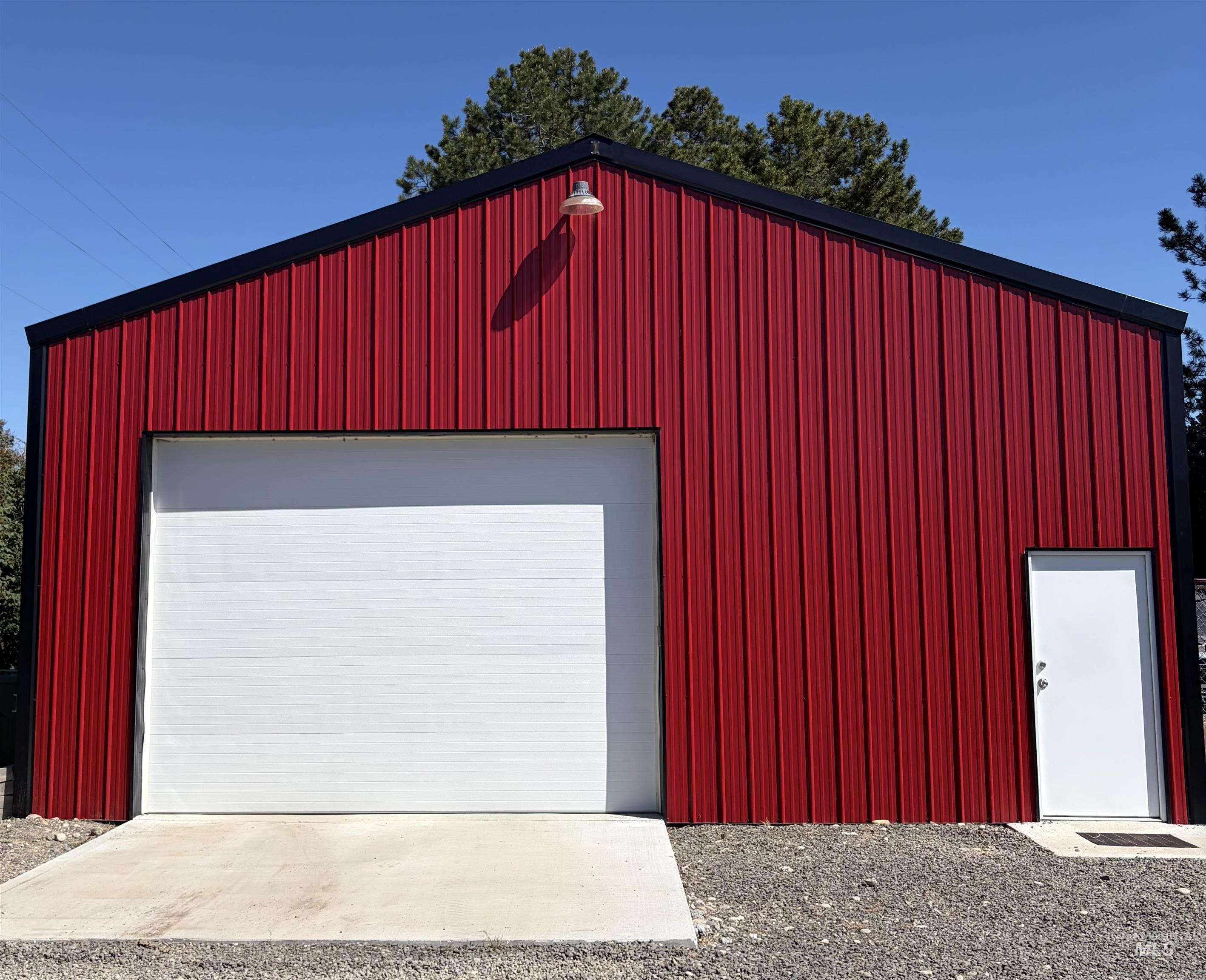 880 Jenkins Creek Road Weiser, ID 83672 - Photo 40 of 43 Red metal siding structure featuring a black trim roofline