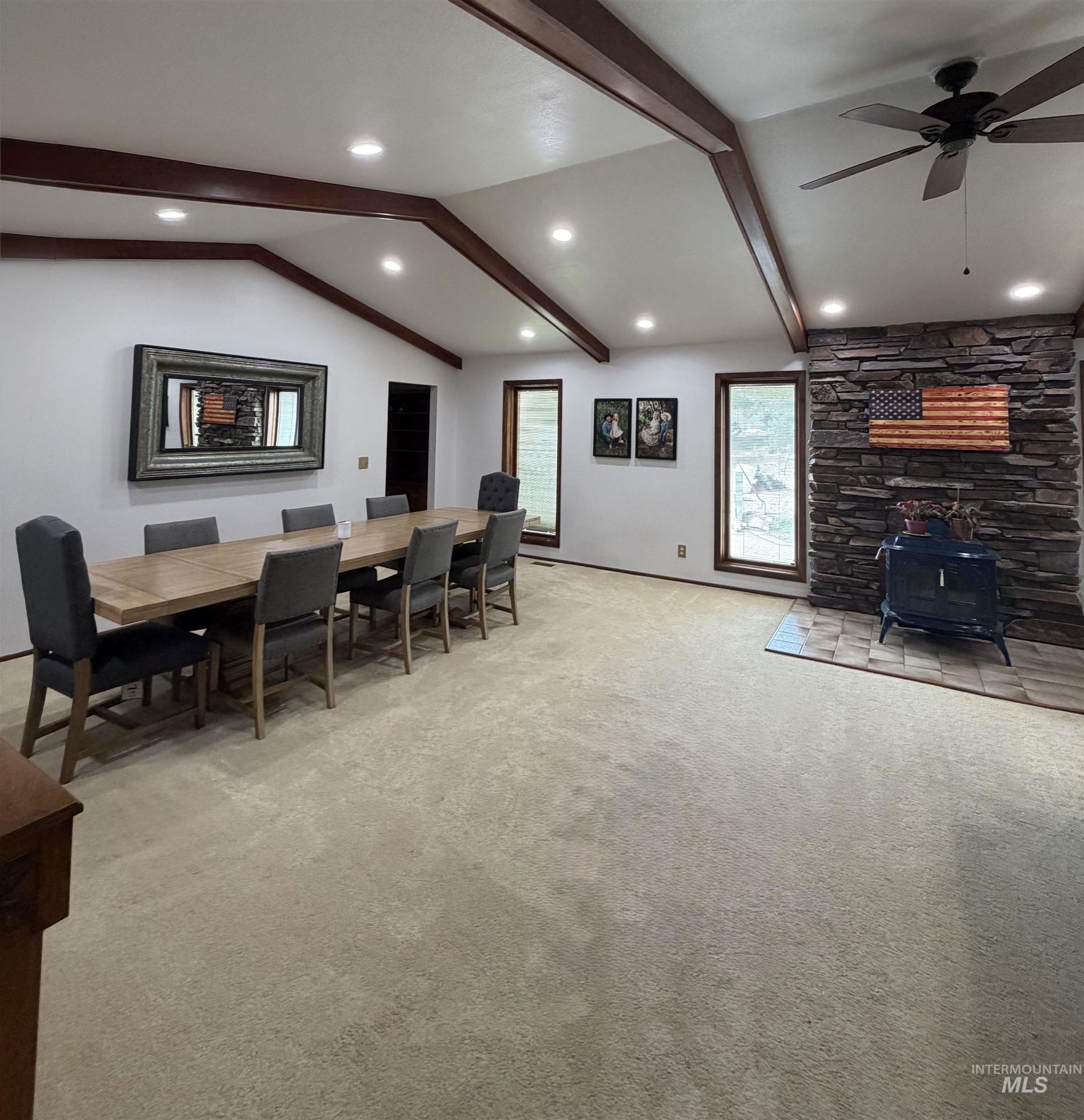 880 Jenkins Creek Road Weiser, ID 83672 - Photo 10 of 43 Spacious living area featuring a vaulted ceiling with exposed wood beams and recessed lighting