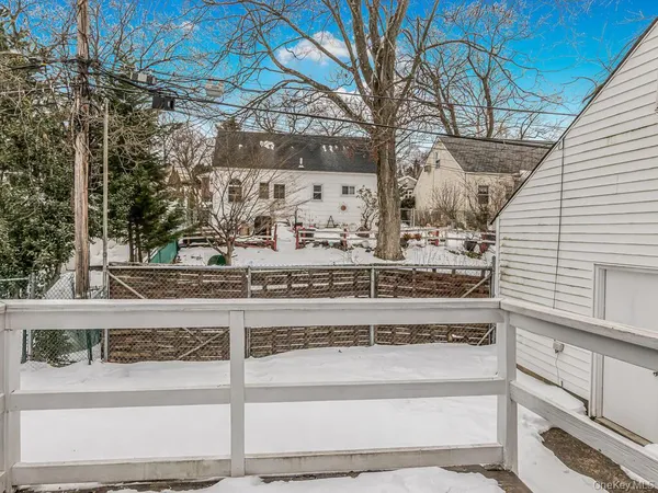 a view of a house with a snow on the wall