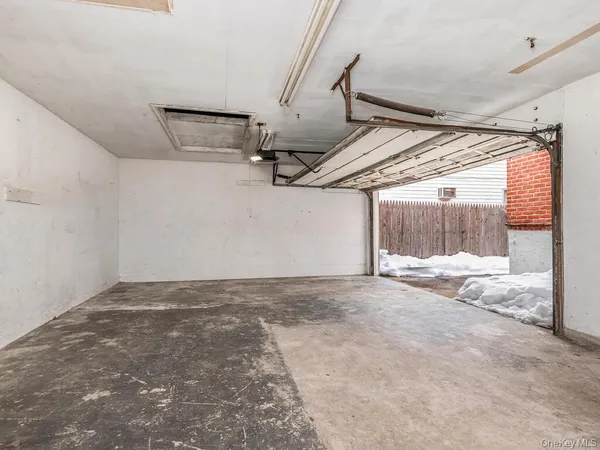 a view of a room with wooden walls