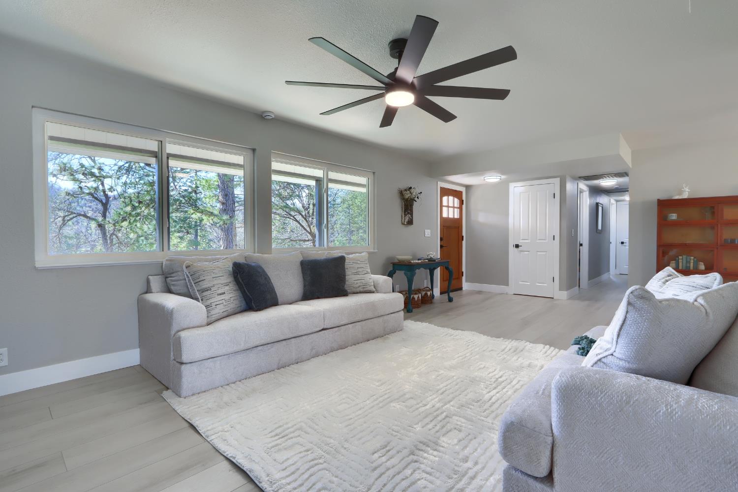 5518 East Whitlock Road Mariposa, CA 95338 - Photo 11 of 57 a living room with furniture and a large window
