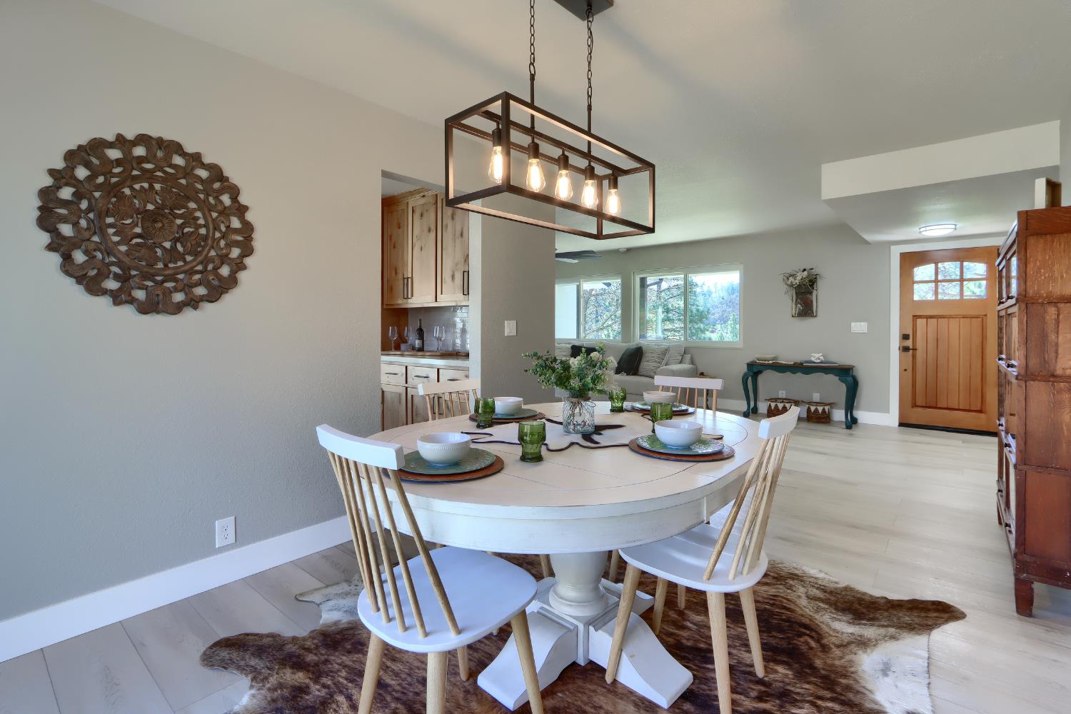 5518 East Whitlock Road Mariposa, CA 95338 - Photo 14 of 57 a view of a dining room with furniture and window