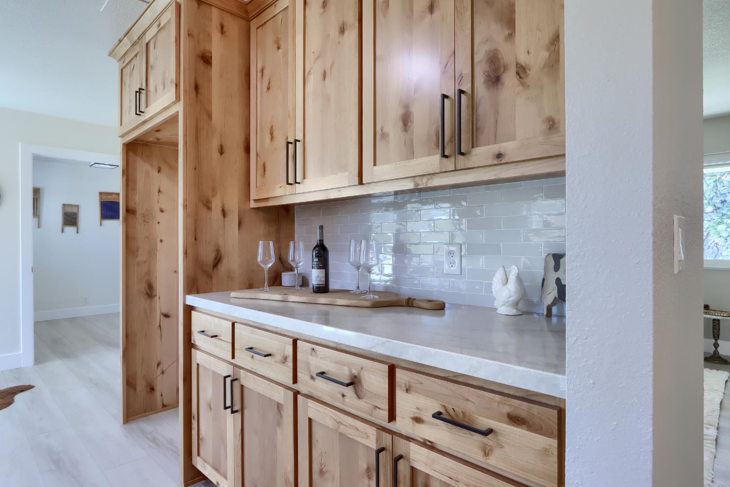 5518 East Whitlock Road Mariposa, CA 95338 - Photo 18 of 57 a kitchen with stainless steel appliances granite countertop a sink and cabinets