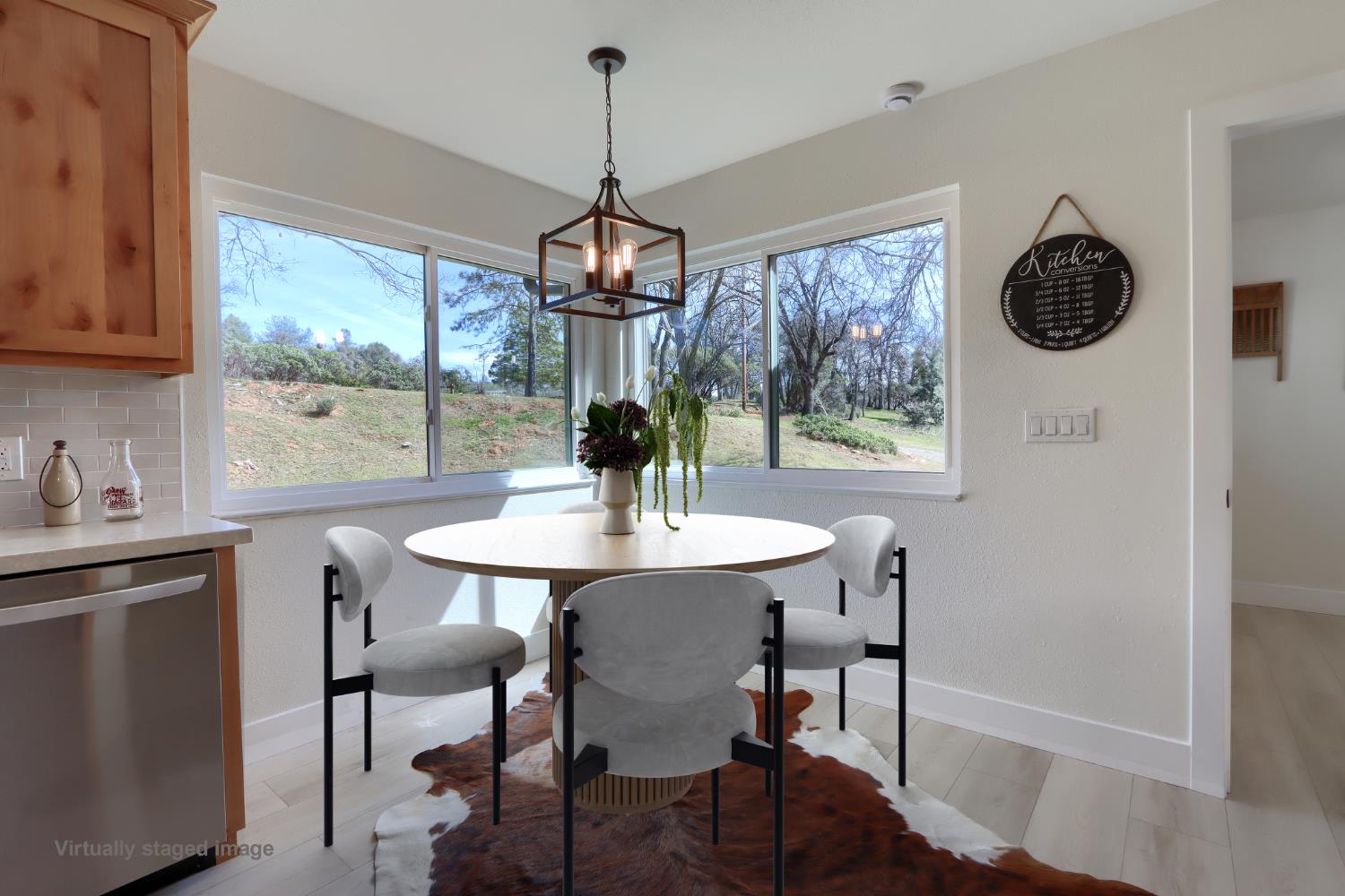 5518 East Whitlock Road Mariposa, CA 95338 - Photo 19 of 57 a view of a dining room with furniture window and outside view