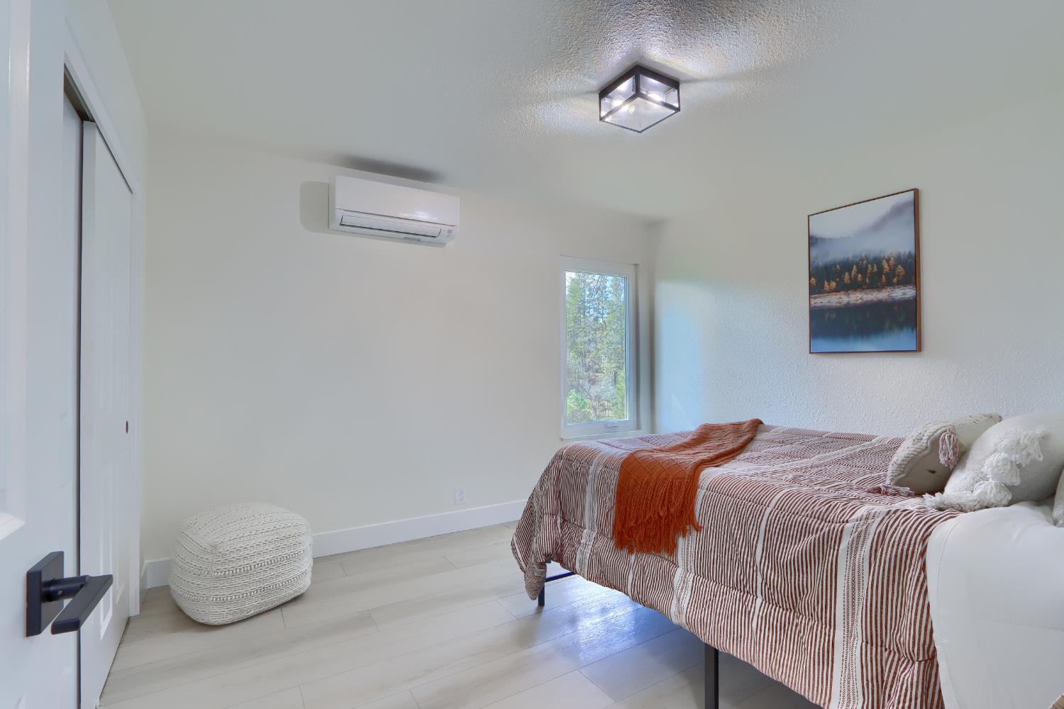 5518 East Whitlock Road Mariposa, CA 95338 - Photo 24 of 57 a bedroom with a bed and window