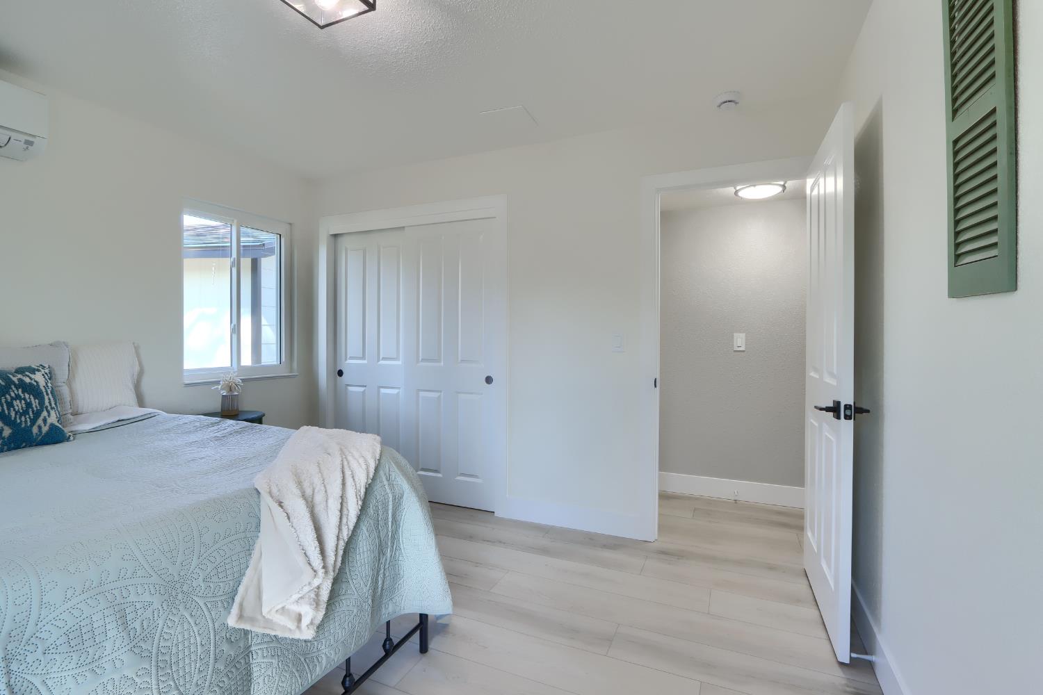 5518 East Whitlock Road Mariposa, CA 95338 - Photo 27 of 57 a bedroom with a bed and a window