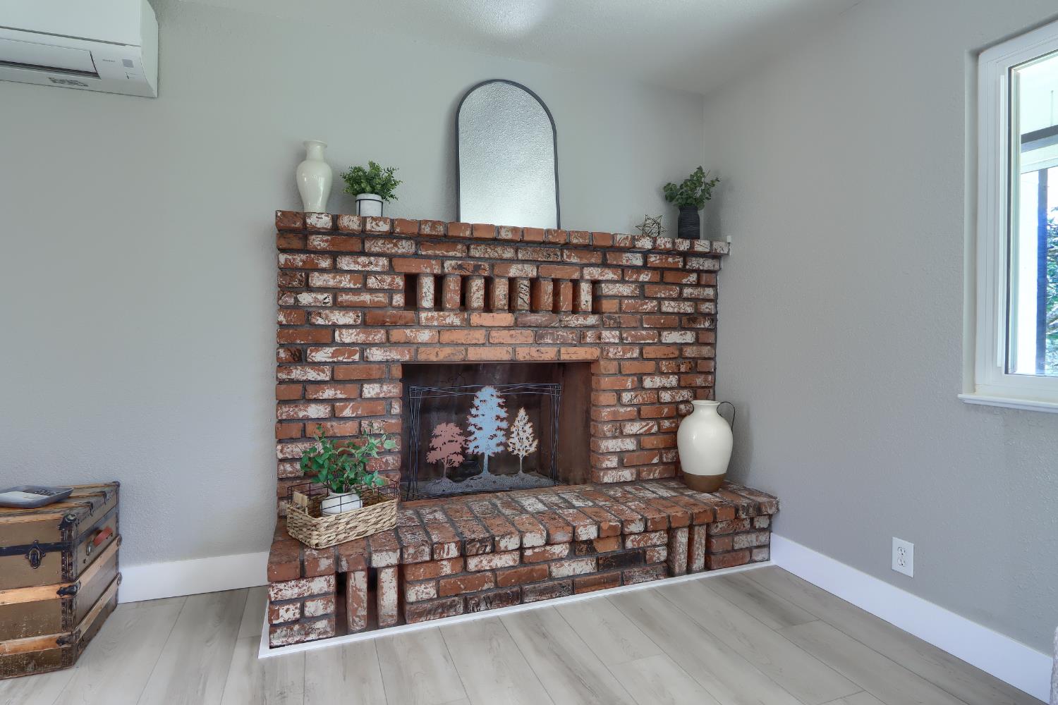 5518 East Whitlock Road Mariposa, CA 95338 - Photo 10 of 57 a living room with furniture and a fireplace
