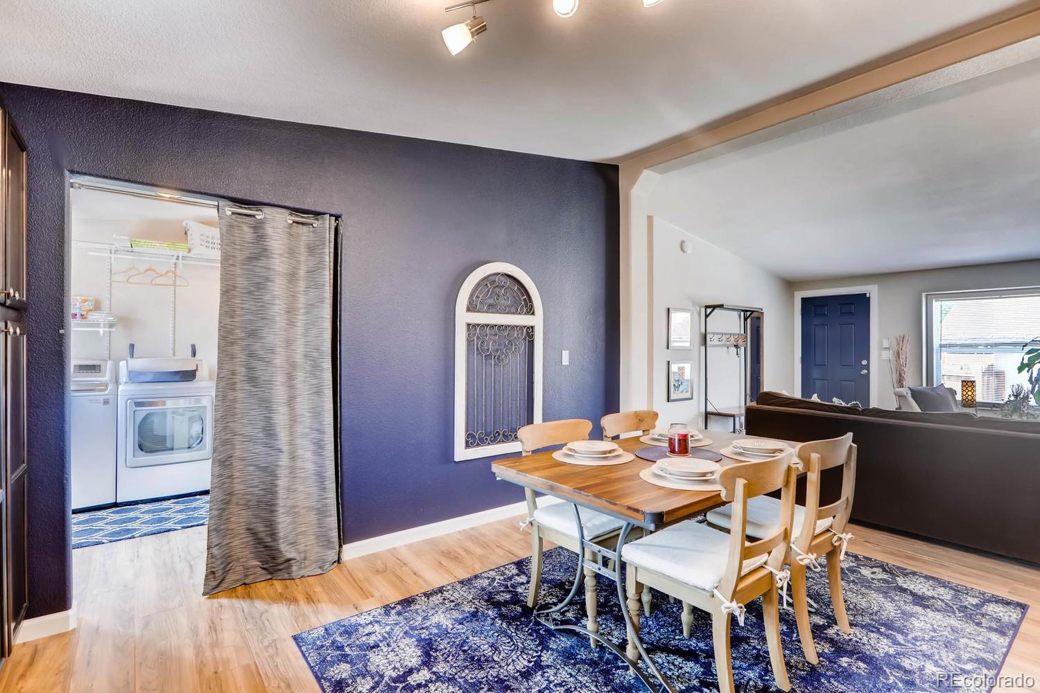 520 South Raleigh Street Denver, CO 80219 - Photo 13 of 27 a dining room with furniture and window