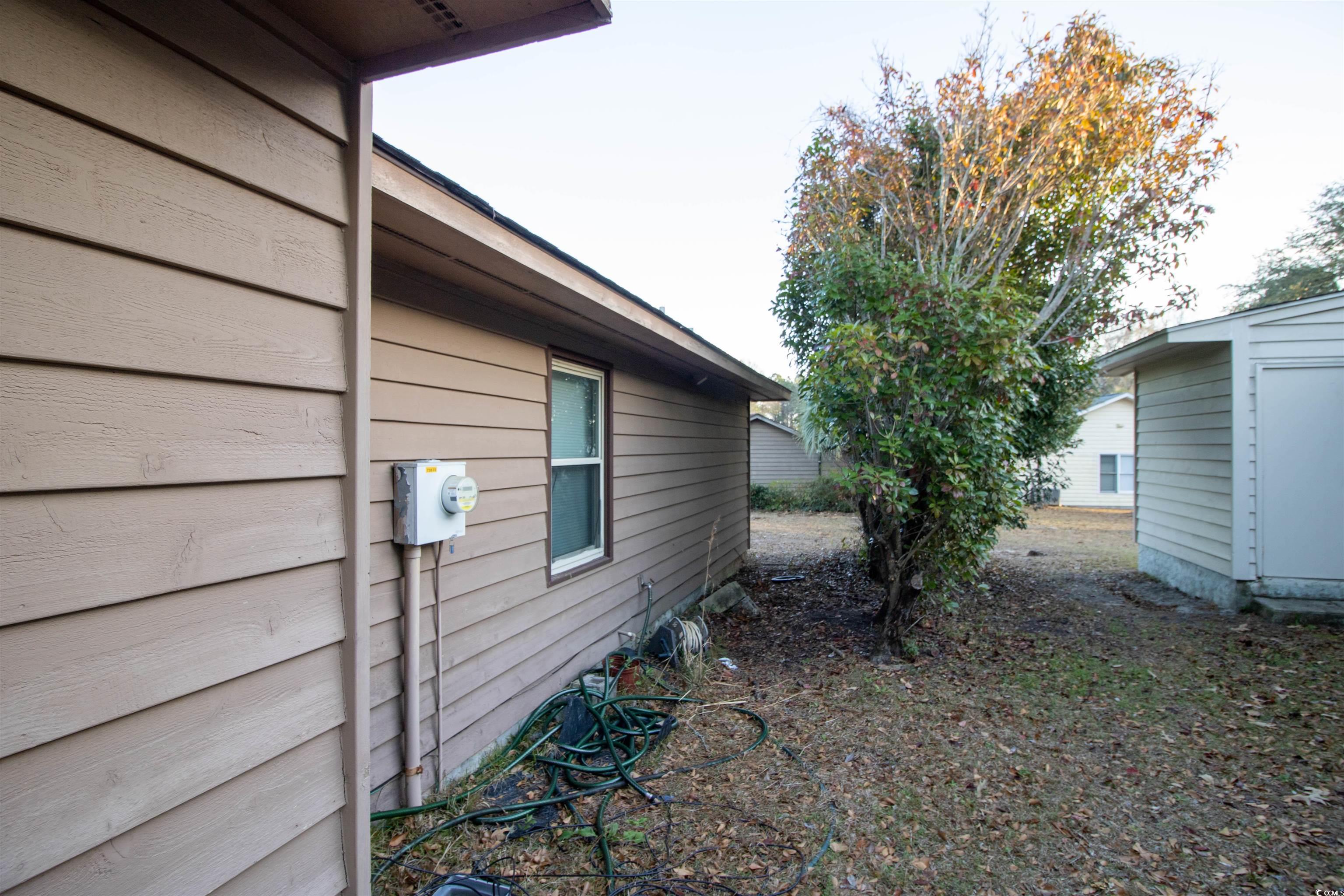 41 Channing Drive Little River, SC 29566 - Photo 17 of 19 View of side of home