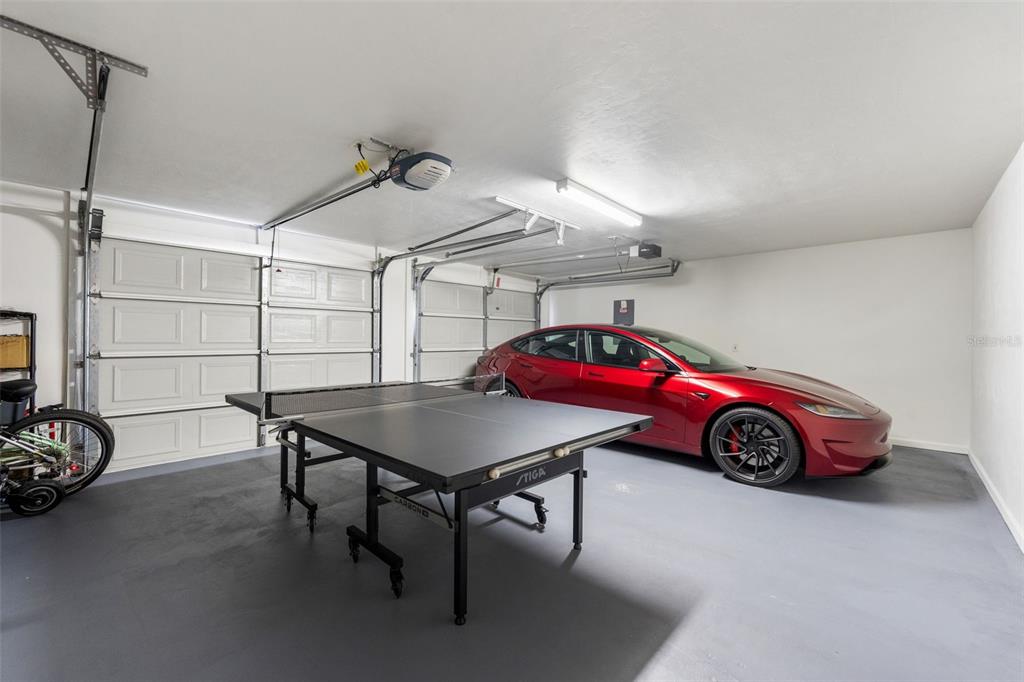 4964 Southwest 91st Drive Gainesville, FL 32608 - Photo 58 of 64 a car is parked in a garage