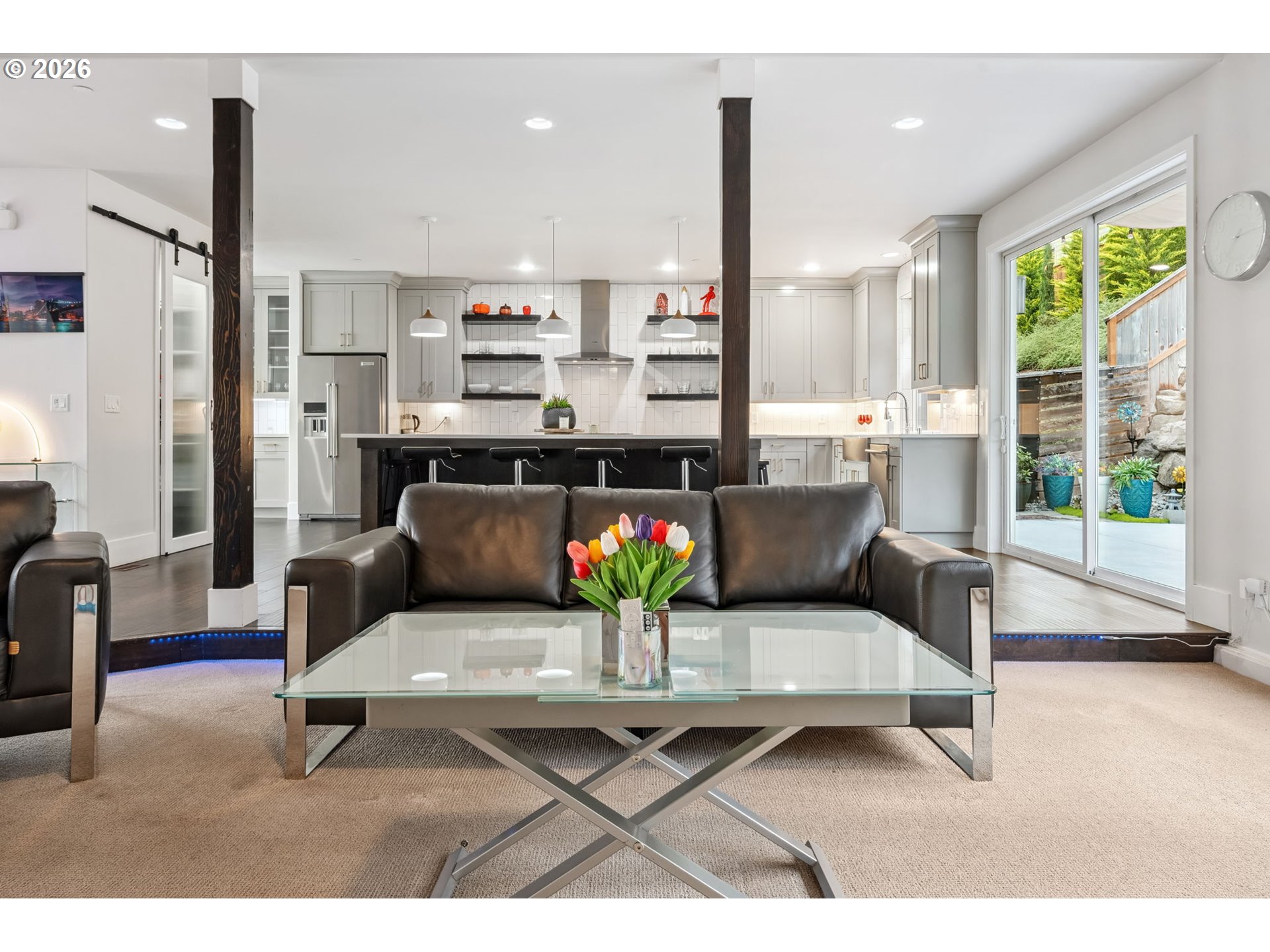 1730 Northwest Klickitat Street Camas, WA 98607 - Photo 11 of 48 a living room with furniture and a floor to ceiling window