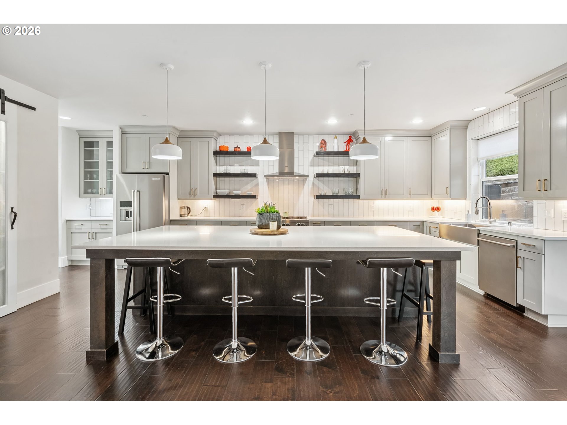 1730 Northwest Klickitat Street Camas, WA 98607 - Photo 15 of 48 a kitchen with a sink and chairs