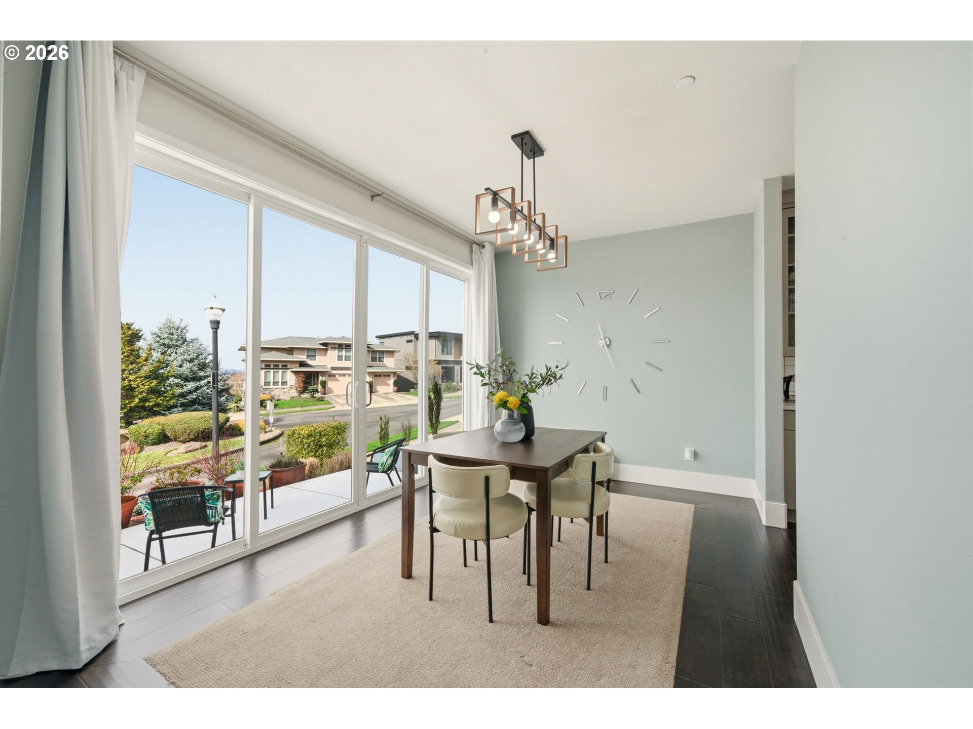 1730 Northwest Klickitat Street Camas, WA 98607 - Photo 20 of 48 a dining room with furniture a chandelier and wooden floor