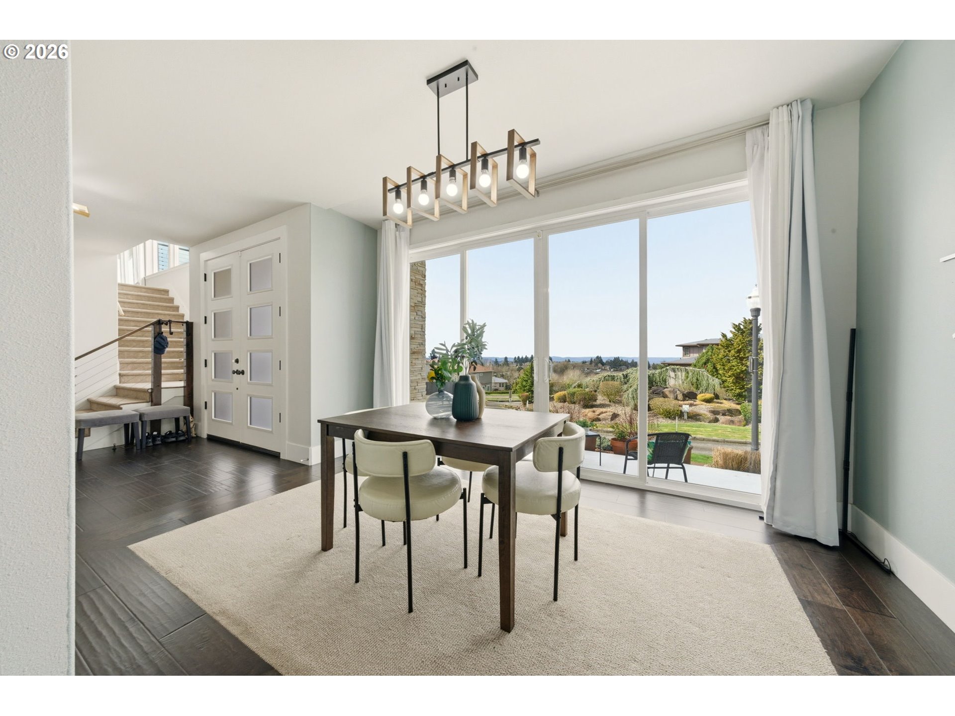 1730 Northwest Klickitat Street Camas, WA 98607 - Photo 21 of 48 a view of a dining room with furniture window and wooden floor