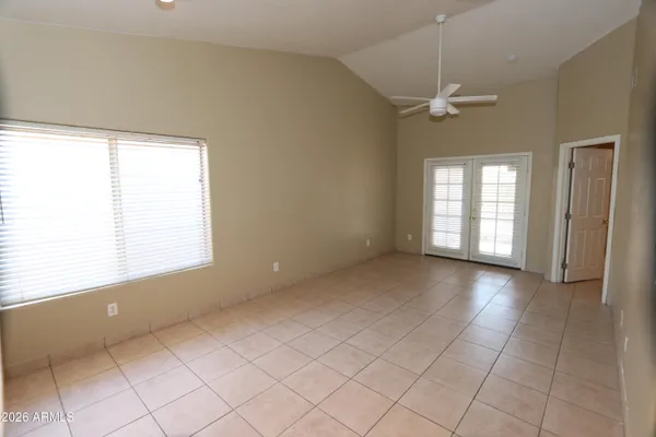 a view of an empty room with a window